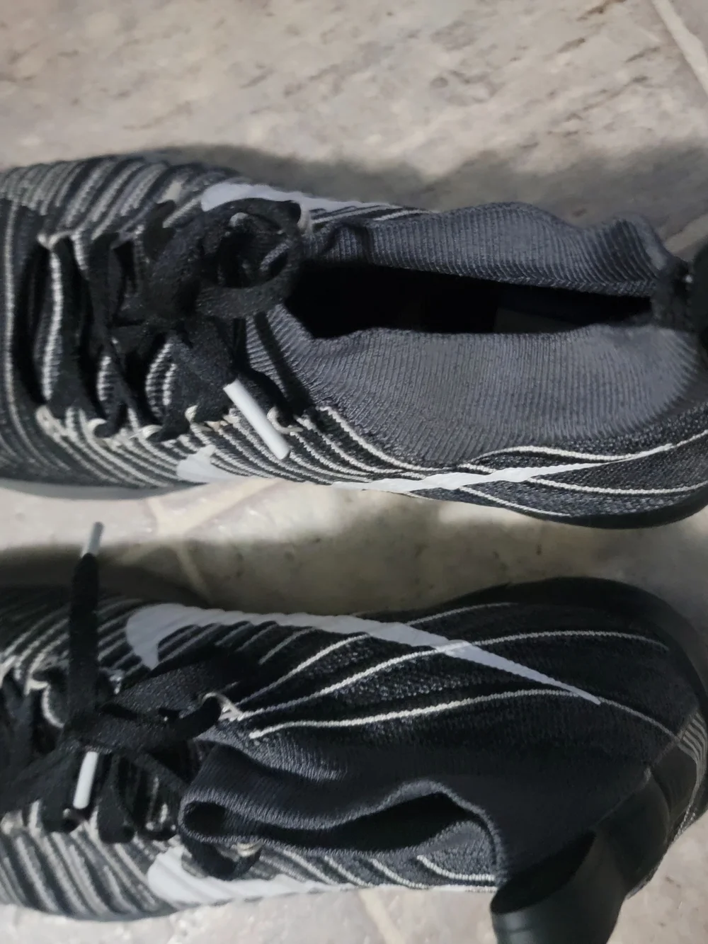 Nike Black and White Running Shoes with Swoosh